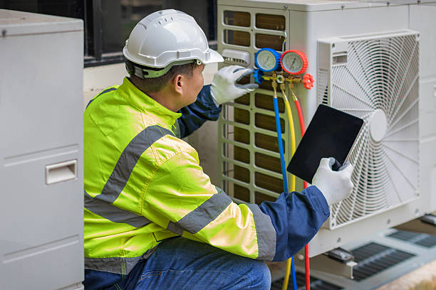 Professional Ac Installation technician working in Butlerville, IN